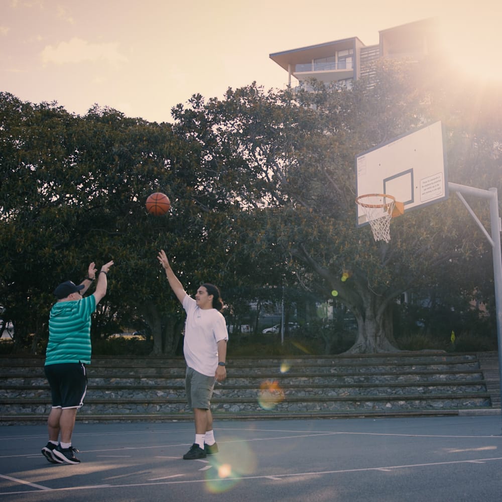 Man shooting a basketball